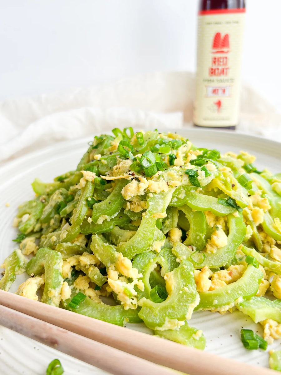 https://redboatfishsauce.com/cdn/shop/articles/20240509121943-bitter_melon_with_eggs_1_1296x_652f0f65-7206-4c8b-947a-9e2f687b8c8a_1200x1200.webp?v=1715384257